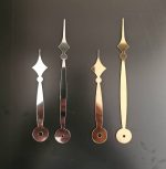 عقربه ساعت در سه رنگ طلایی و نقره ای و مشکی رنگ طلایی و نقره ای براق